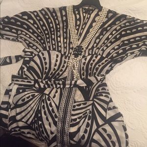 Beautiful black and white blouse with belt tie